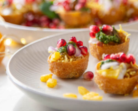 Dahi Puri Chaat is served on a white plate.